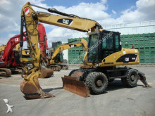 Caterpillar M316D Hammer/Greiferleitung Klima Schild und Pratz