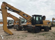escavatore per movimentazione Caterpillar