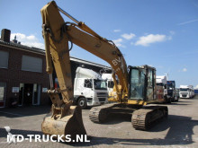 pelle rail/route Caterpillar