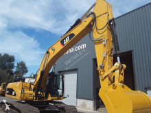pelle rail/route Caterpillar