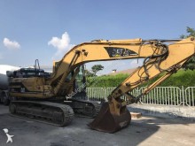 pelle sur pneus Caterpillar