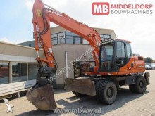 graafmachine op banden Doosan