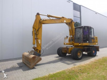 graafmachine op banden Hydrema