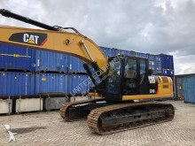pelle rail/route Caterpillar