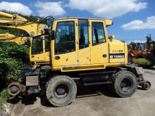 graafmachine op banden Atlas