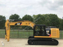 pelle rail/route Caterpillar