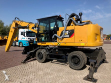 graafmachine op banden Caterpillar