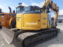 escavatore cingolato New Holland