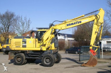 graafmachine op banden Komatsu