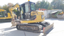 mini escavatore Caterpillar