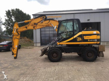 graafmachine op banden JCB