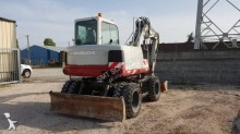 graafmachine op banden Takeuchi