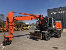 graafmachine op banden Hitachi