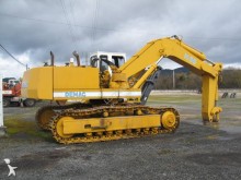 escavatore cingolato Demag