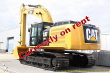 escavatore intermediario strada/rotaia Caterpillar