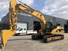 escavatore intermediario strada/rotaia Caterpillar