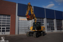 graafmachine op banden Caterpillar