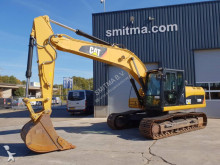 pelle rail/route Caterpillar