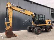 pelle sur pneus Caterpillar