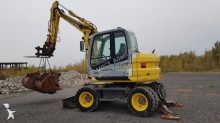 pelle sur pneus New Holland