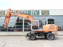 tweedehands graafmachine op banden