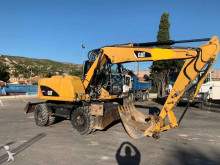escavatore gommato Caterpillar
