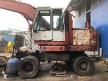 Solmec walking excavator