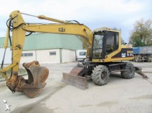 pelle sur pneus Caterpillar