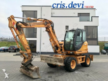 pelle sur pneus Case