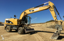 pelle sur pneus Caterpillar