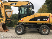 escavatore Caterpillar