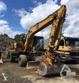 graafmachine op banden Caterpillar