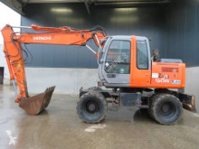 tweedehands graafmachine op banden