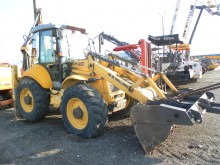 экскаватор-погрузчик с жесткой рамой New Holland