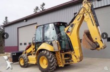 мини экскаватор-погрузчик Caterpillar