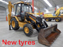 экскаватор-погрузчик Caterpillar