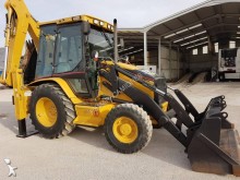 экскаватор-погрузчик с сочлененной рамой Caterpillar