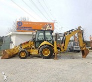 retroescavadora articulada Caterpillar