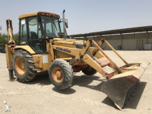 экскаватор-погрузчик Komatsu