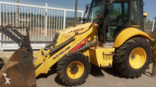 экскаватор-погрузчик с жесткой рамой New Holland