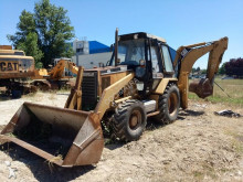 экскаватор-погрузчик с жесткой рамой Caterpillar