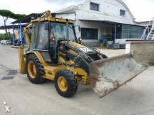 экскаватор-погрузчик с жесткой рамой Caterpillar