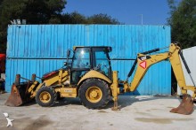 retroescavadora articulada Caterpillar