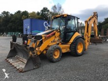 экскаватор-погрузчик с жесткой рамой Caterpillar