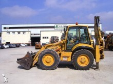 экскаватор-погрузчик с жесткой рамой Komatsu