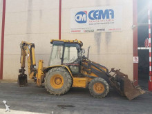 экскаватор-погрузчик Caterpillar