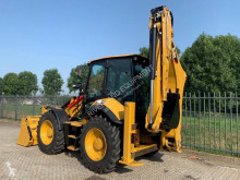 Ters kepçe yükleyici (bekolu yükleyici) Caterpillar
