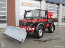 camión caja abierta Unimog