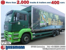 camion piattaforma trasporto bibite MAN