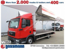 camion piattaforma trasporto bibite MAN